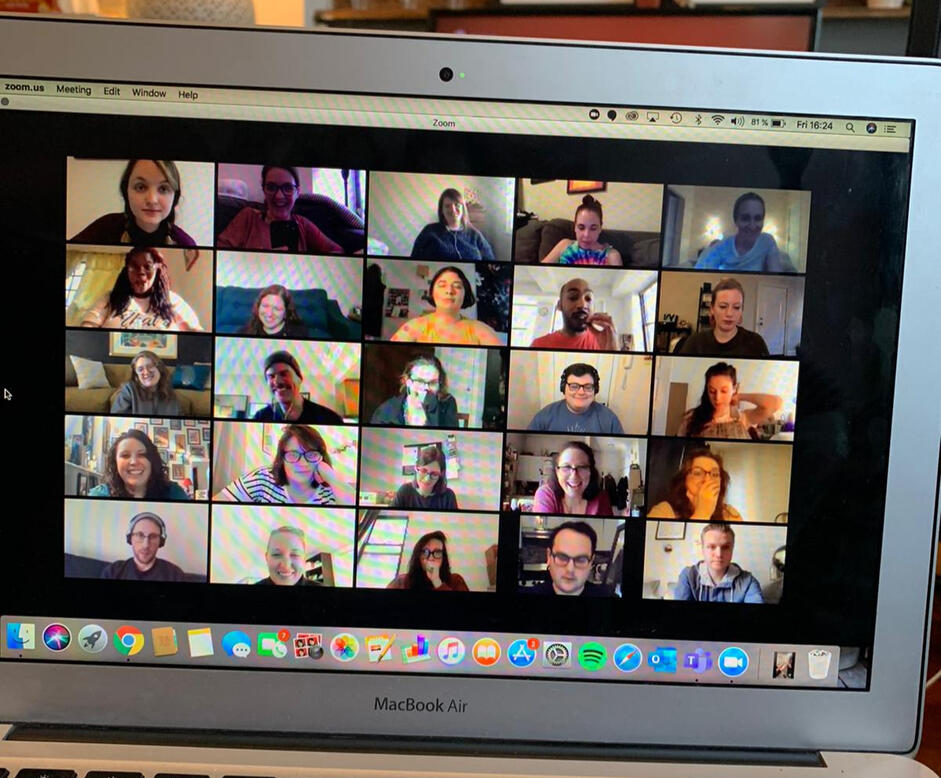 Photo of computer with many faces on an online workshop